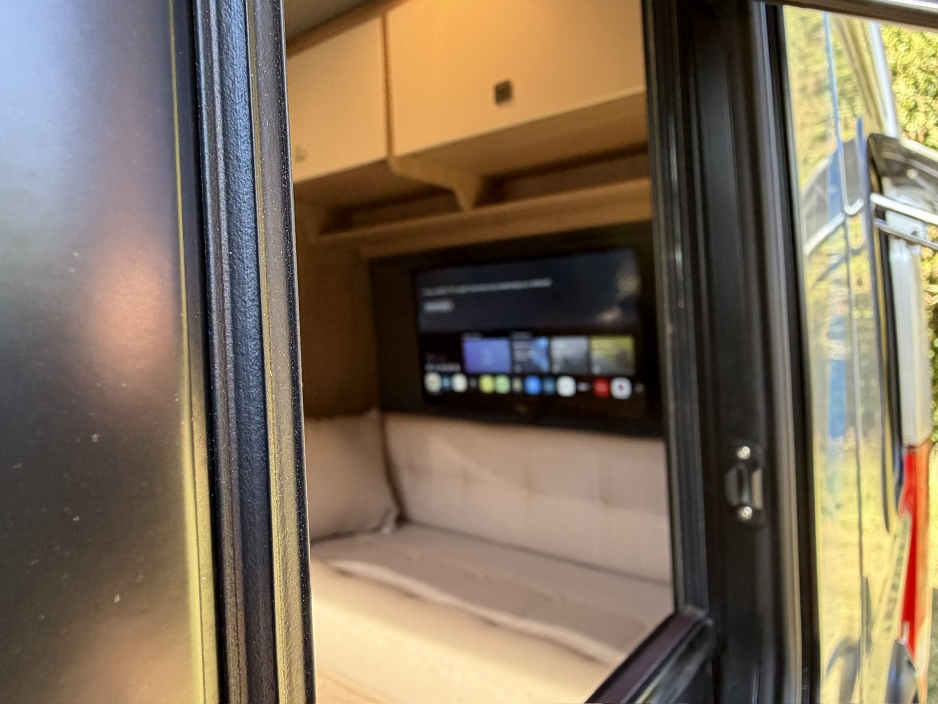Bossway Origin full kitchen with open slide door and garden view